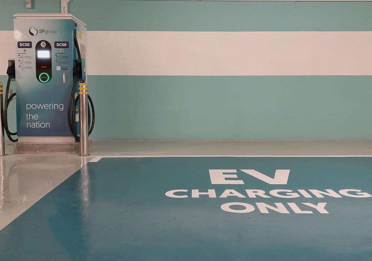 Grand Park City Hall Singapore Exterior photo EV charging bay at Heathrow Airport