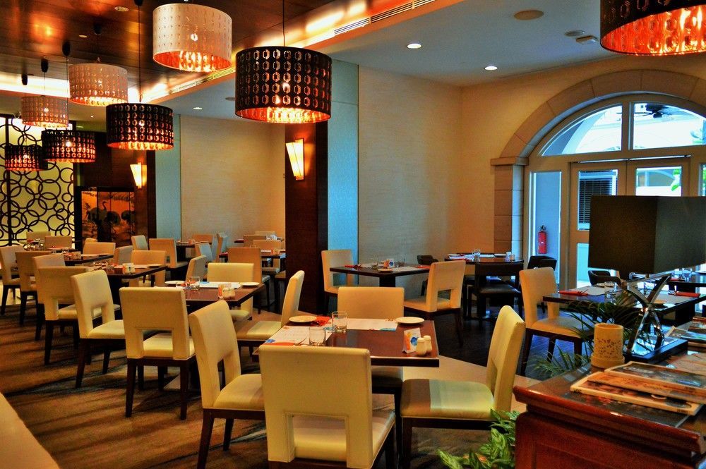 Grand Park City Hall Singapore Exterior photo The interior of a restaurant in Dubai